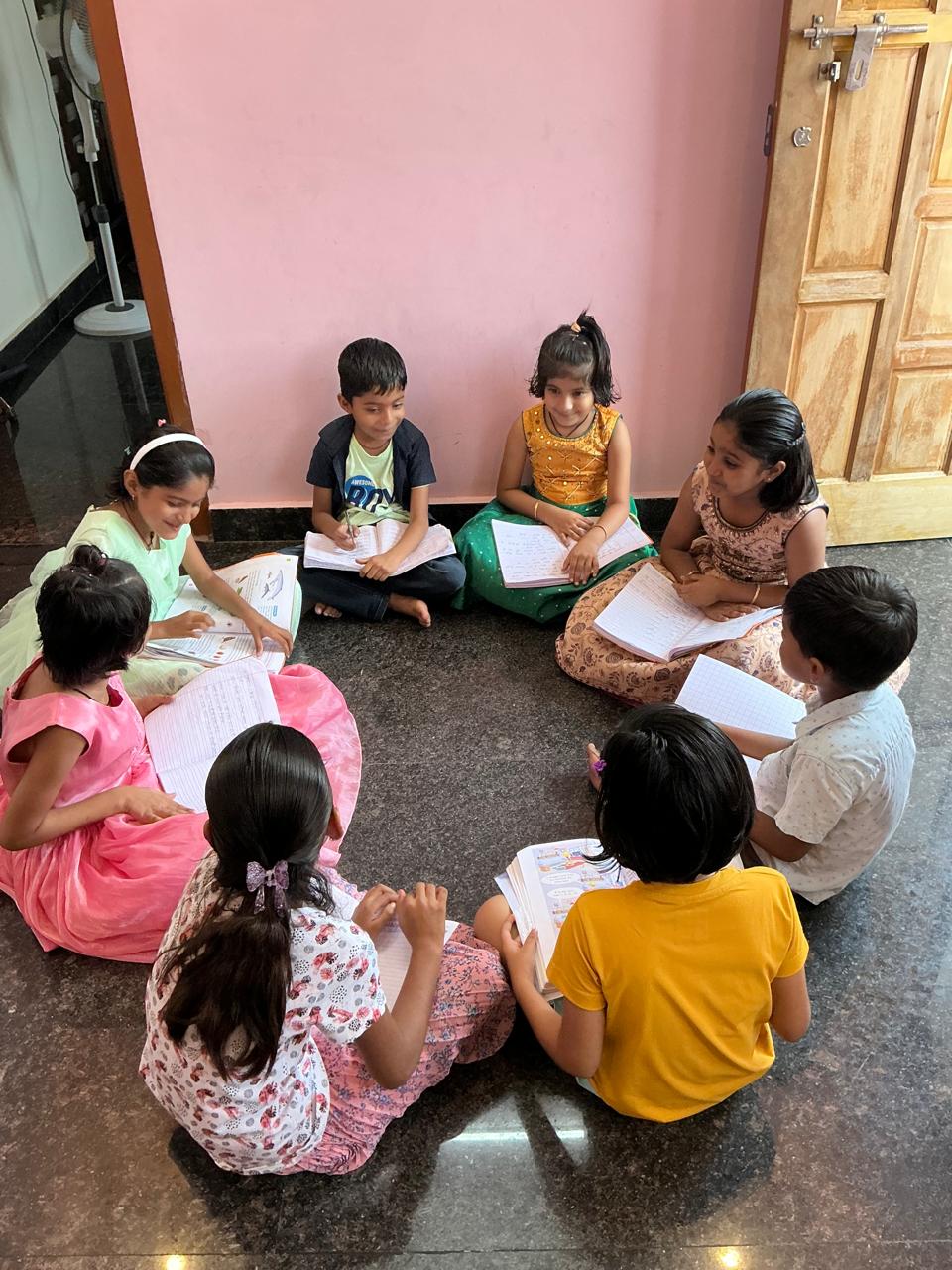 Debate competition at Divya Classes with students presenting arguments
